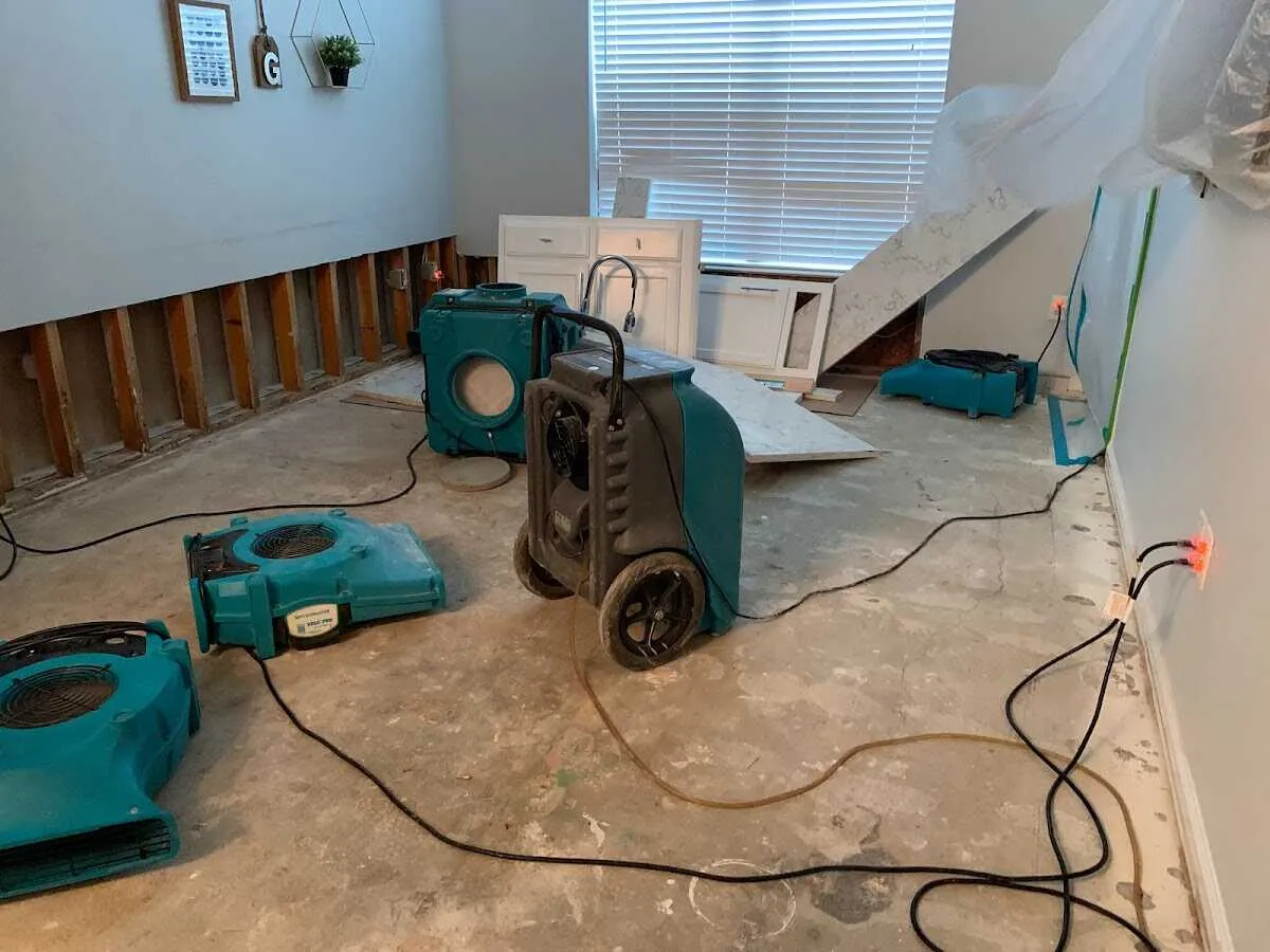 Dehumidifier in flood-cut room for Water Damage Restoration in Newman